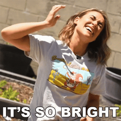 A Woman Wearing A T-Shirt That Says ' It 'S So Bright ' GIF