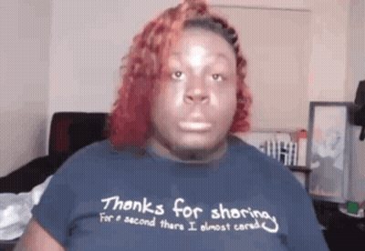 A Woman Wearing A T-Shirt That Says Thanks For Sharing GIF
