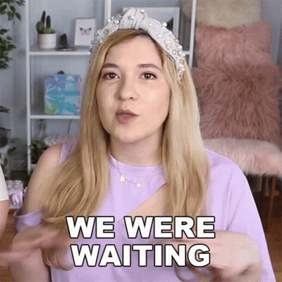 A Woman Wearing A Tiara And A Necklace Says " We Were Waiting " GIF