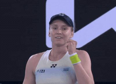 A Woman Wearing A Visor With A Yonex Logo On It Is Smiling GIF