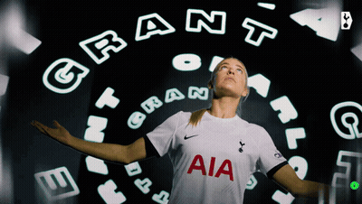 A Woman Wearing A White Aia Jersey Stands In Front Of A Circle Of Letters GIF
