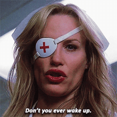 A Woman Wearing A White Eye Patch With A Red Cross On It Says Don 'T You Ever Wake Up GIF