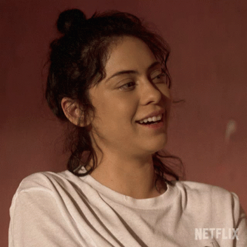 Woman Wearing White Netflix Shirt GIF