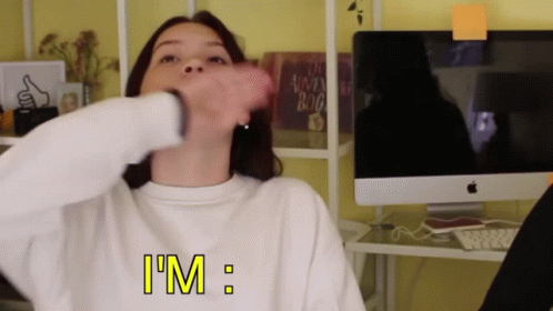 A Woman Wearing A White Sweater With The Word I 'M On It GIF