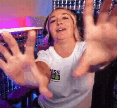 A Woman Wearing A White T-Shirt That Says Miss Ob GIF