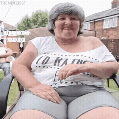 A Woman Wearing A White T-Shirt That Says ( O.ra.t.c. ) On It GIF