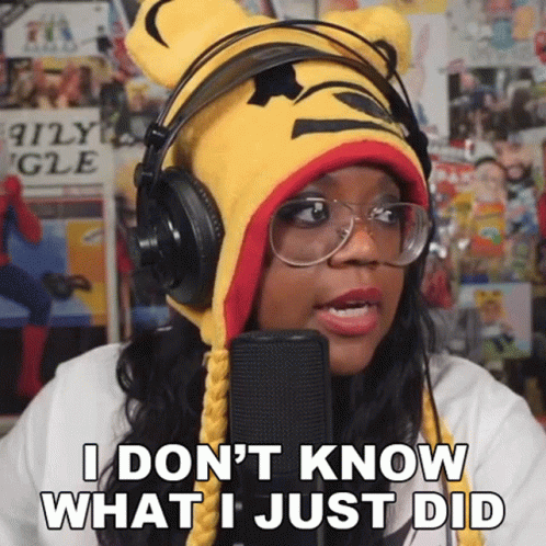 A Woman Wearing A Winnie The Pooh Hat And Headphones Says " I Don 'T Know What I Just Did " GIF
