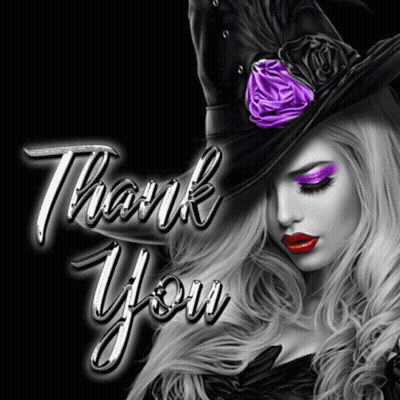 A Woman Wearing A Witch Hat With Purple Eye Shadow And Red Lips Says Thank You GIF