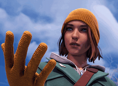 A Woman Wearing A Yellow Hat And A Green Jacket Holds Up Her Glove GIF