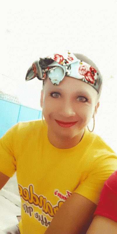 A Woman Wearing A Yellow T-Shirt That Says " Always " On It GIF