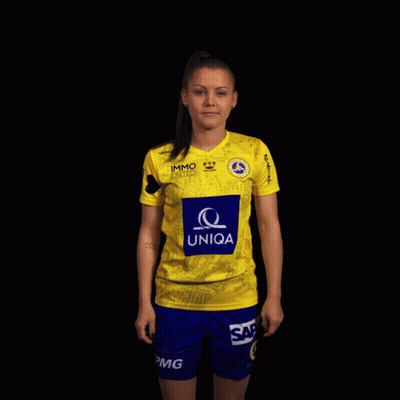 A Woman Wearing A Yellow Uniqa Shirt And Blue Shorts GIF