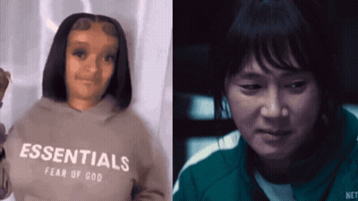A Woman Wearing An Essentials Hoodie Next To A Man GIF
