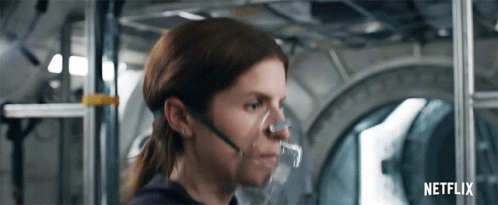 A Woman Wearing An Oxygen Mask With Netflix Written On The Bottom Right GIF