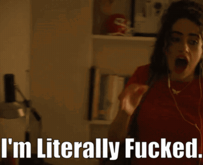 A Woman Wearing Earbuds Says I 'M Literally Fucked GIF