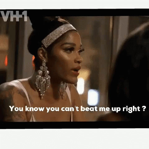 A Woman Wearing Earrings And A Headband Says You Know You Can 'T Beat Me Up Right .. GIF