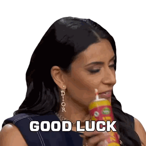 A Woman Wearing Earrings That Say Dior Is Holding A Can Of Soda And Says Good Luck Sticker
