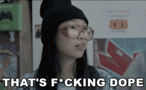 A Woman Wearing Glasses And A Beanie Says " That 'S F * Cking Dope " GIF