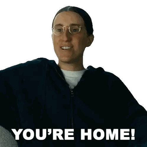 A Woman Wearing Glasses And A Black Hoodie Says You 'Re Home Sticker