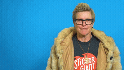 A Woman Wearing Glasses And A Fur Coat Has The Word Baller Written Above Her Head GIF
