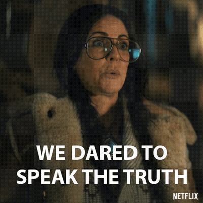 A Woman Wearing Glasses And A Fur Coat Says We Dared To Speak The Truth On Netflix GIF