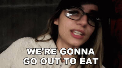 A Woman Wearing Glasses And A Hat Says We 'Re Gonna Go Out To Eat GIF
