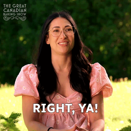 A Woman Wearing Glasses And A Pink Dress With The Words Right Ya GIF