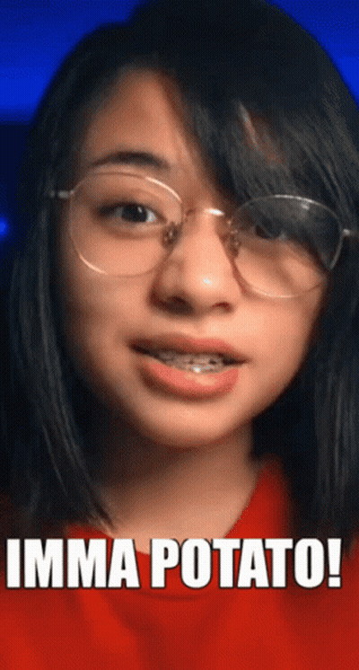 A Woman Wearing Glasses And A Red Shirt Has The Words Imma Potato Written On Her Face GIF