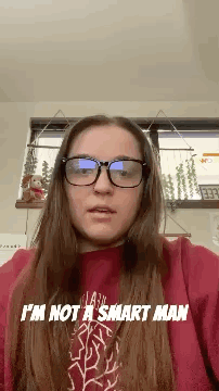 A Woman Wearing Glasses And A Red Shirt Says " I 'M Not A Smart Man " GIF