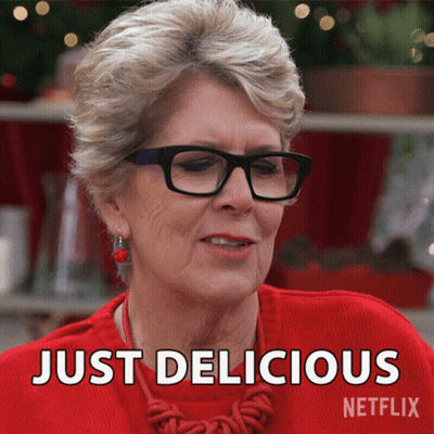 A Woman Wearing Glasses And A Red Sweater Says Just Delicious Netflix GIF