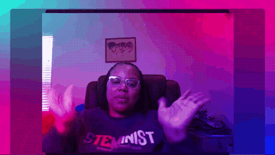 A Woman Wearing Glasses And A Shirt That Says Steminist GIF