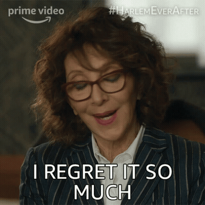 A Woman Wearing Glasses And A Striped Suit Says I Regret It So Much GIF