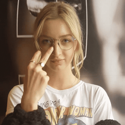A Woman Wearing Glasses And A T-Shirt That Says King For A Dirty Woman GIF