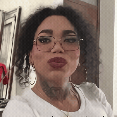 A Woman Wearing Glasses And A White Shirt Has A Tattoo On Her Neck That Says " I Love You " GIF