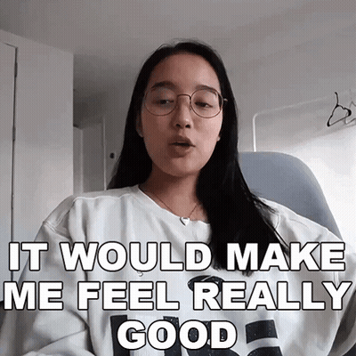 A Woman Wearing Glasses And A White Shirt That Says It Would Make Me Feel Really Good GIF