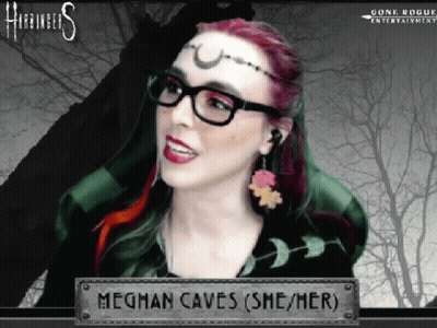 A Woman Wearing Glasses And Earrings Is Named Meghan Caves ( She / Her ) GIF