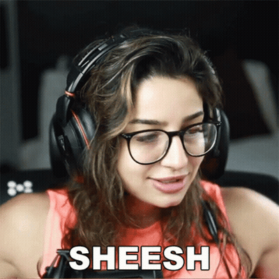 A Woman Wearing Glasses And Headphones Has The Word Sheesh Above Her Head GIF