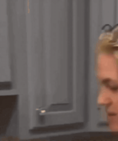 A Woman Wearing Glasses Has The Words And Swallow It On Her Face GIF