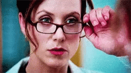 Woman Adjusting Glasses GIF