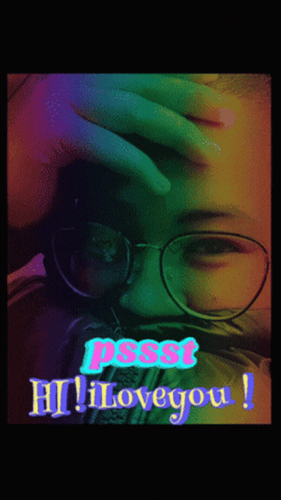 A Woman Wearing Glasses Is Covering Her Face With Her Hand And The Words Pssst Hi Love You GIF
