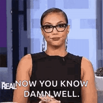 A Woman Wearing Glasses Is Smiling And Saying `` Real Now You Know Damn Well '' . GIF