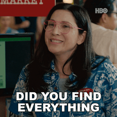 A Woman Wearing Glasses Is Smiling And Says Did You Find Everything GIF