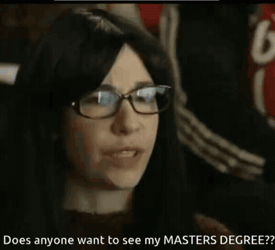 A Woman Wearing Glasses Says Does Anyone Want To See My Masters Degree GIF