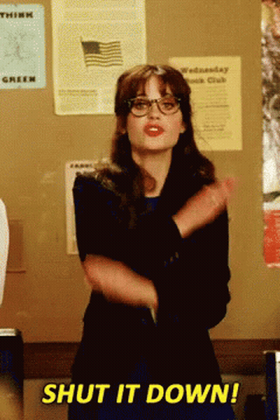 A Woman Wearing Glasses Says Shut It Down While Dancing GIF