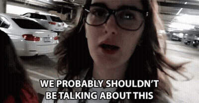 A Woman Wearing Glasses Says We Probably Should N't Be Talking About This GIF