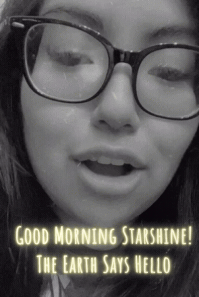 A Woman Wearing Glasses With The Words Good Morning Starshine The Earth Says Hello Below Her GIF