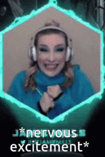 A Woman Wearing Headphones And A Blue Sweater With The Words Nervous Excitement On The Bottom GIF
