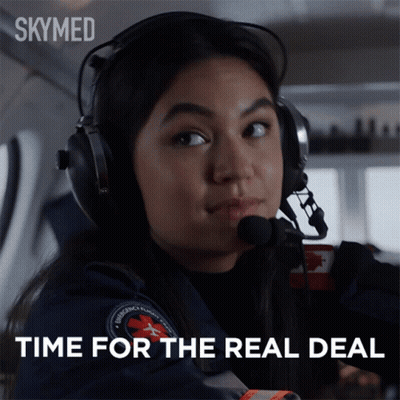 A Woman Wearing Headphones And A Headset Says Time For The Real Deal GIF