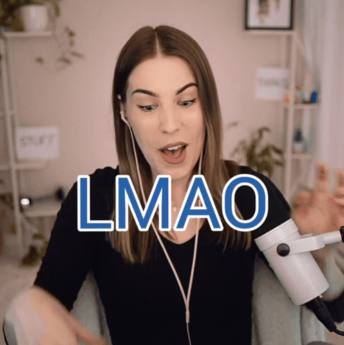 A Woman Wearing Headphones And A Microphone With The Word Lmao Above Her GIF