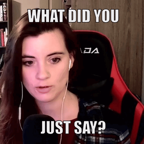 A Woman Wearing Headphones And A Red Gaming Chair Is Asking What Did You Just Say GIF