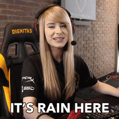 A Woman Wearing Headphones And A Shirt That Says Dignitas Sits In Front Of A Keyboard GIF